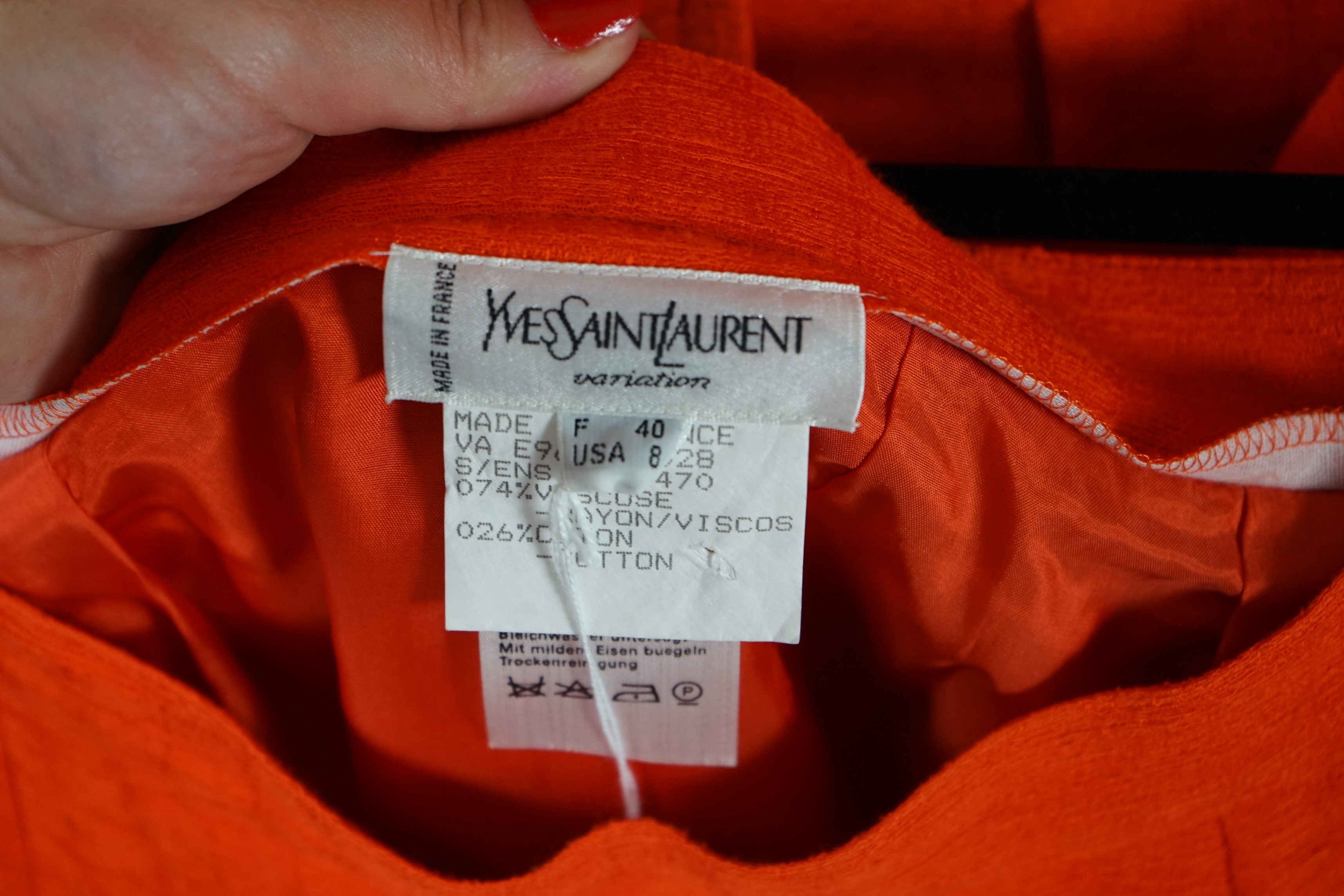 Two vintage Yves Saint Laurent variation lady's skirt suits, royal blue and orange. F 40 (UK 12).Please note alterations to make the waist smaller may have been carried out on some of the skirts. Proceeds to Happy Paws P